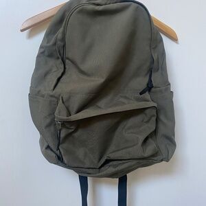 Green backpack from Everlane